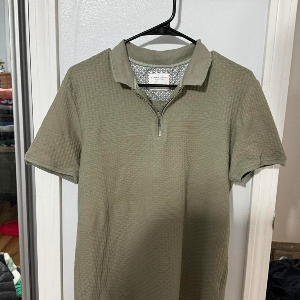 Ricky Singh green polo shirt